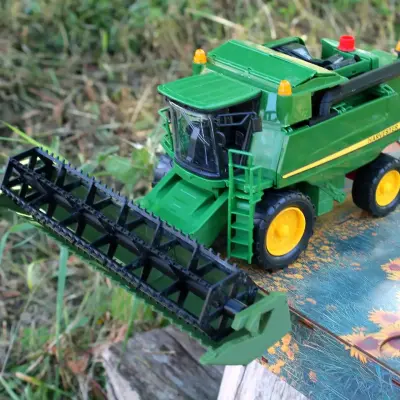 Автоматичний наливатор-комбайн John Deere з пшеничною жаткою на 6 чарок